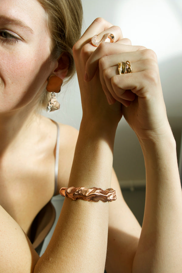 Sterling King Molten Bracelet in Rose Gold paired with Ridge Rings, Pavé Diamond Wave Ring and Lucite Nugget Drop Earrings