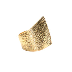 sculptural gold ring with carved texture